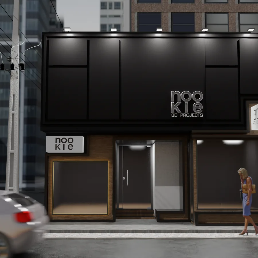 Dark commercial storefront with an illuminated sign, seen from the pavement
