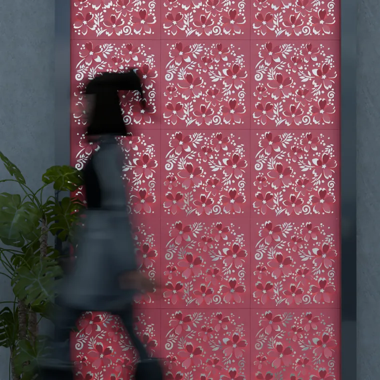 Pattern 4 from the perforated ACM pack, applied to a wall panel